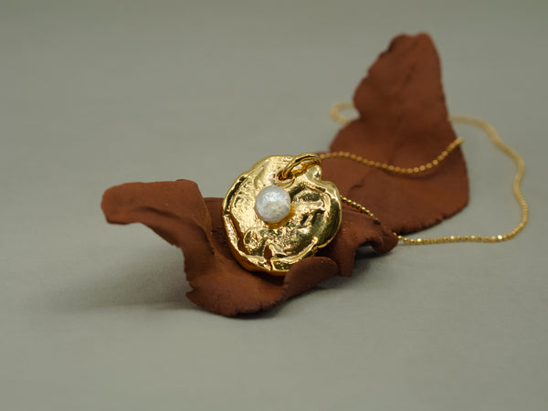 Emblem Gold and Pearl Pendant