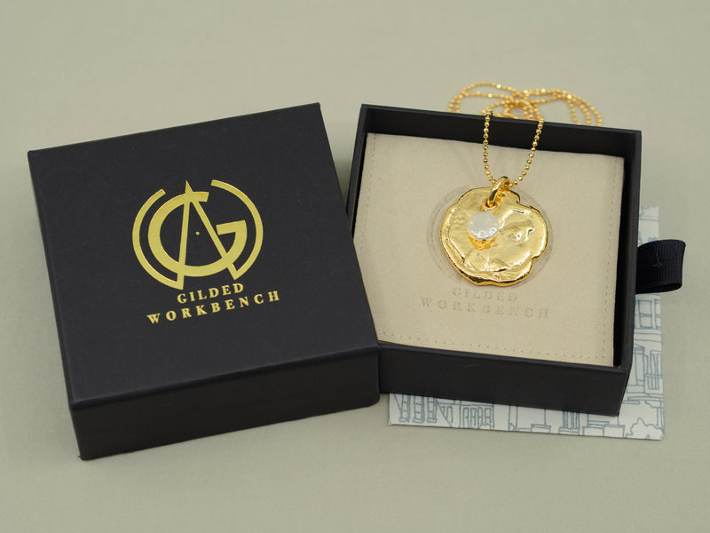 Emblem Gold and Pearl Pendant