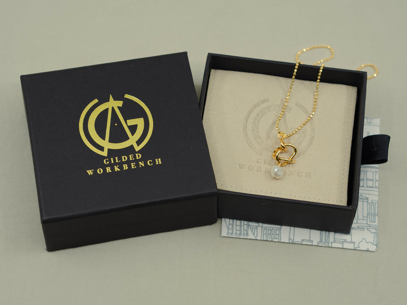 Entwined Gold and Pearl Pendant